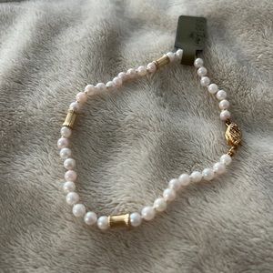 Culture pearls with gold